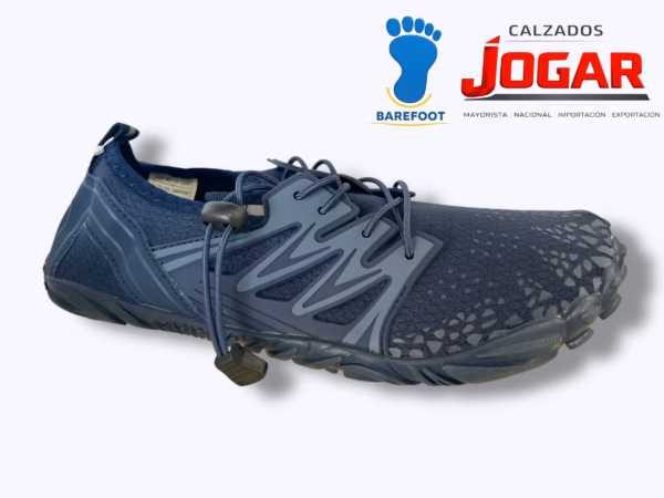 Zapatilla barefoot caballero 9-1249 con suela plana, horma amplia y flexibilidad natural para una pisada libre y estable.